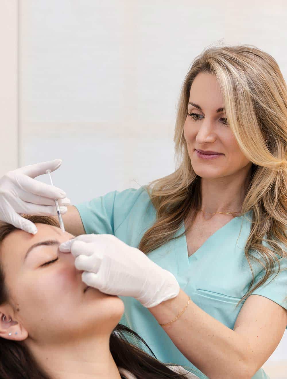 Patient Receiving Injectable Treatment at Arsenault Aesthetics