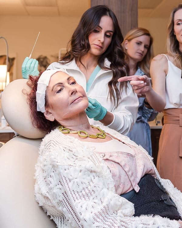 thread lift demonstration at annual event