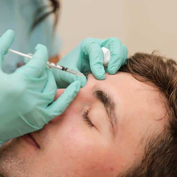 Man getting Botox in Forehead